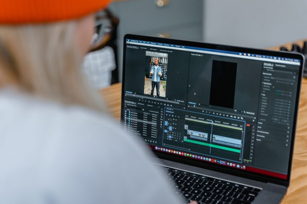 Creator editing a YouTube Shorts video on a laptop timeline
