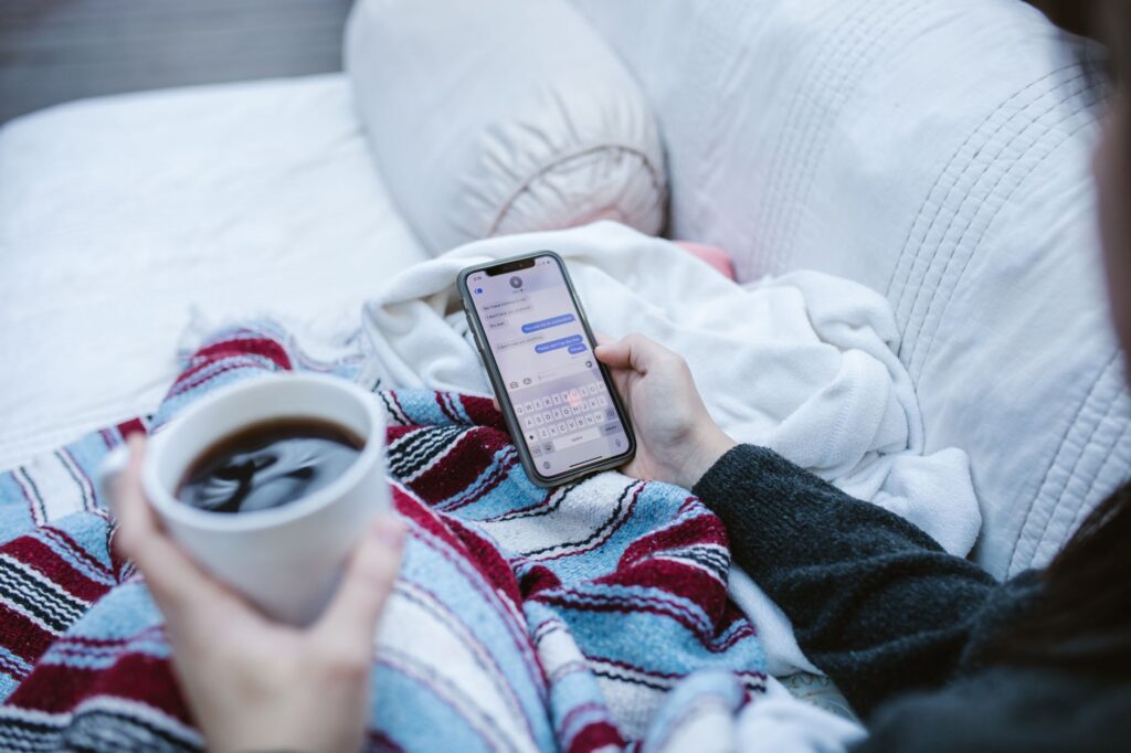 Customer reading WhatsApp marketing messages on a smartphone, the inbox where error 131049 limits apply