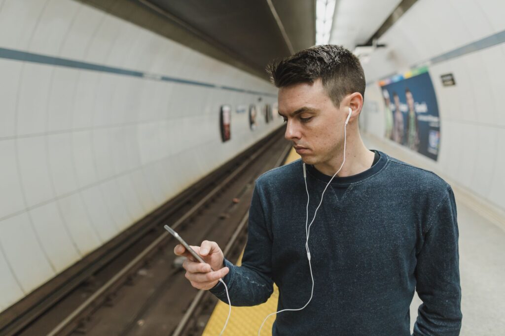 Founder listening to a Gemini Notebook Audio Overview briefing on a smartphone