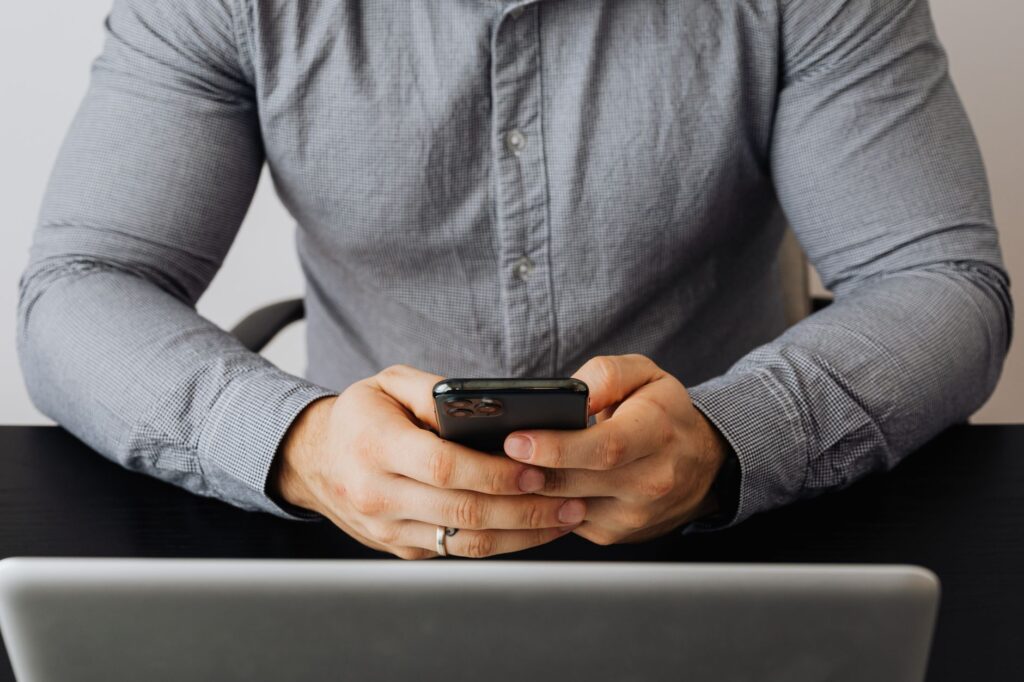 Indian consumer researching life insurance through ChatGPT ads on a phone