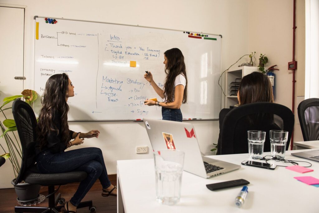 Indian marketing team planning digital marketing trends 2026 strategy on a whiteboard