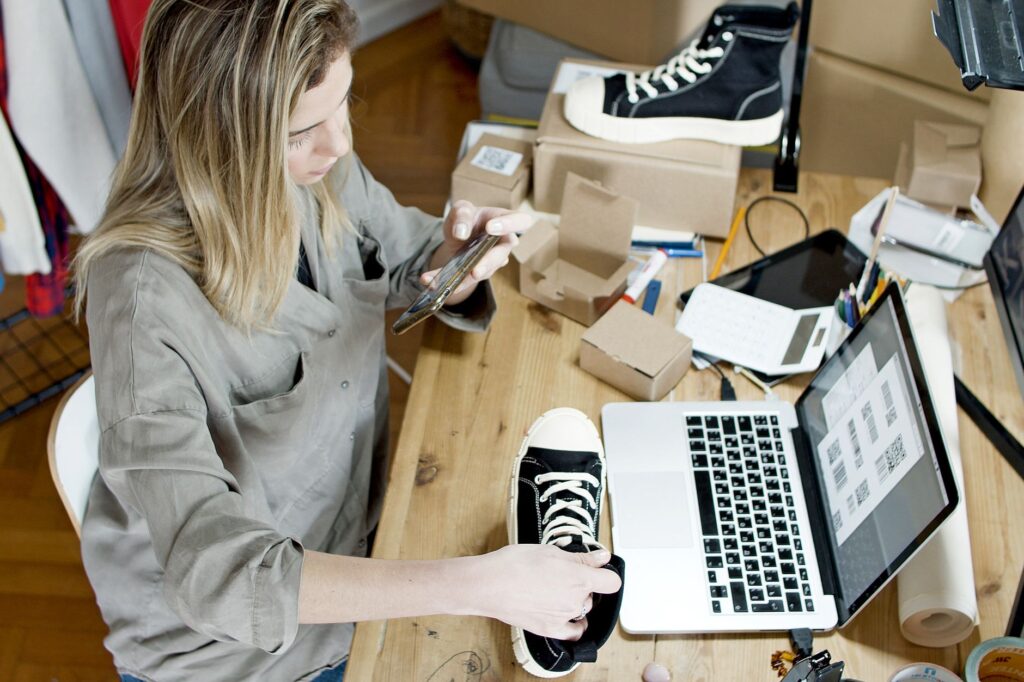 Indian small business owner reviewing digital marketing plan on laptop