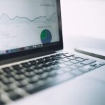 Laptop on a desk showing website analytics charts, illustrating Google Search Console features for SEO reporting