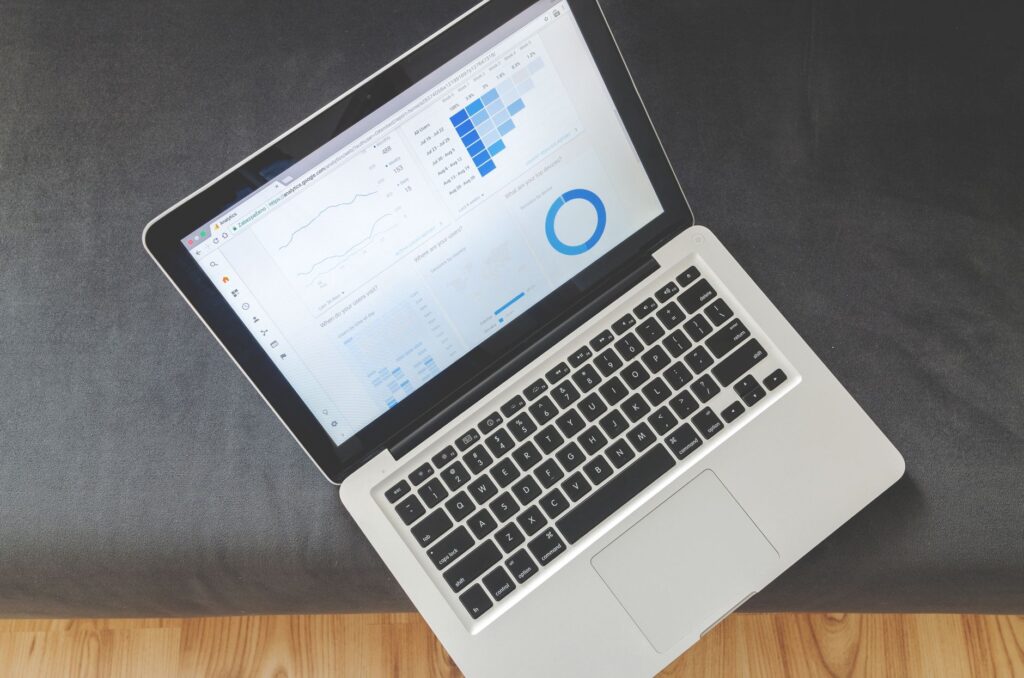 Marketer checking advertising settings on a laptop to opt out of ChatGPT Ads creative enhancements