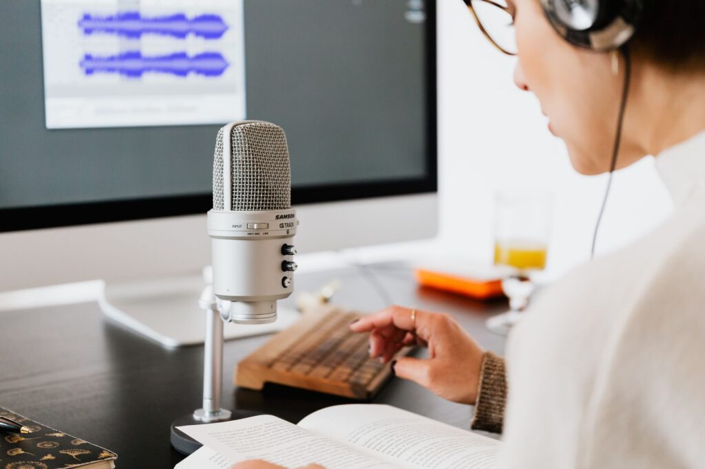 Marketer recording an original voice-over for a YouTube Short