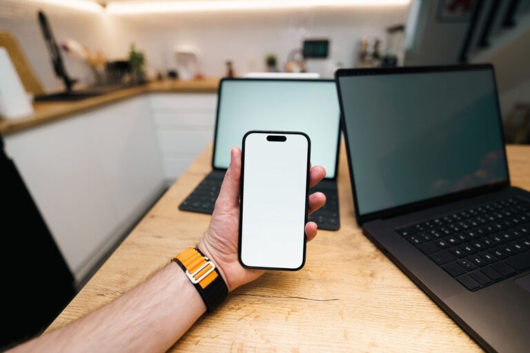 Marketer reviewing Meta ads updates for Facebook and Instagram campaigns on a laptop