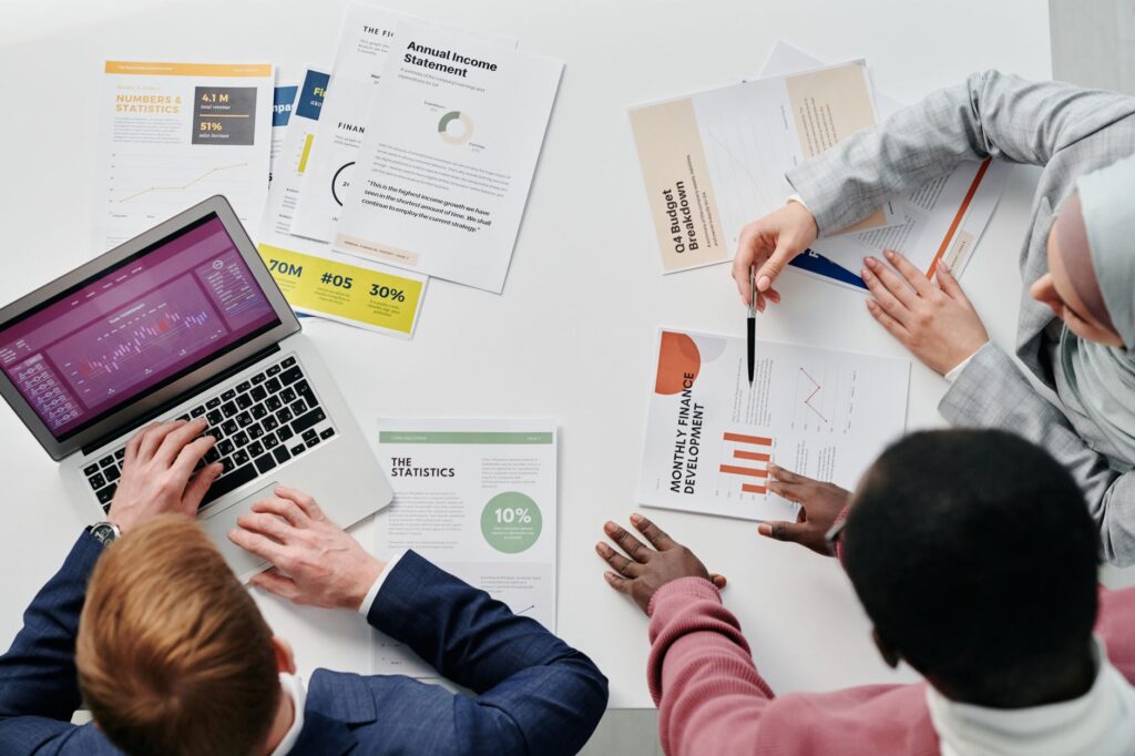 Marketing team reviewing search campaign data to prepare for Google AI Mode ads